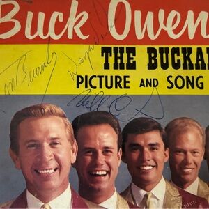 Buck Owens and The Buckaroos magazine with signatures